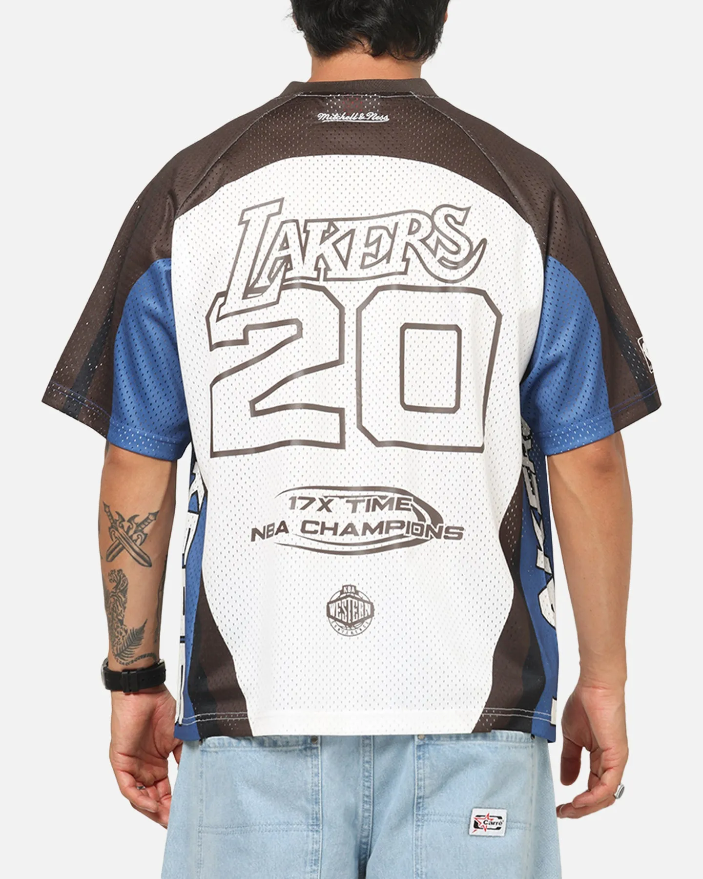 Mitchell & Ness Los Angeles Lakers Warehouse Rave Jersey White/Brown sold by Culture Kings