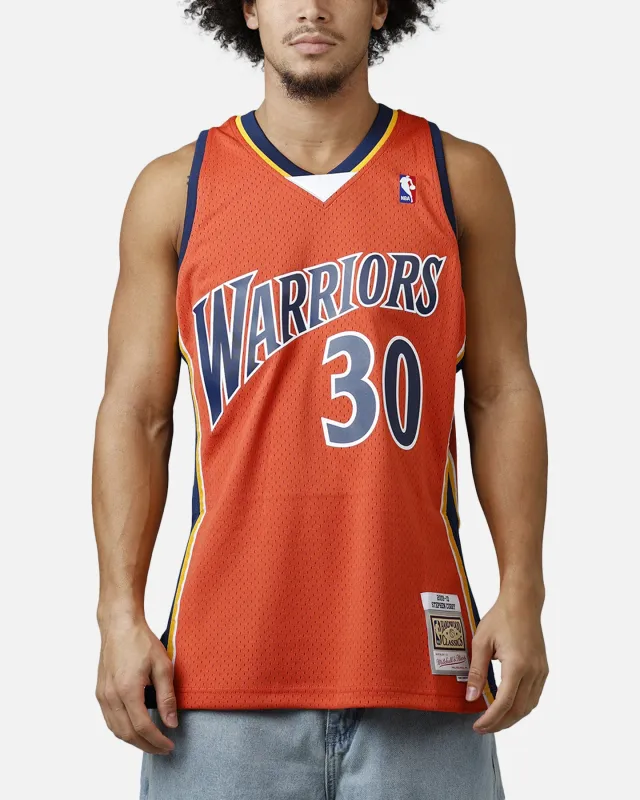 Mitchell & Ness Golden State Warriors Stephen Curry 2010 Swingman Jersey Orange sold by Culture Kings