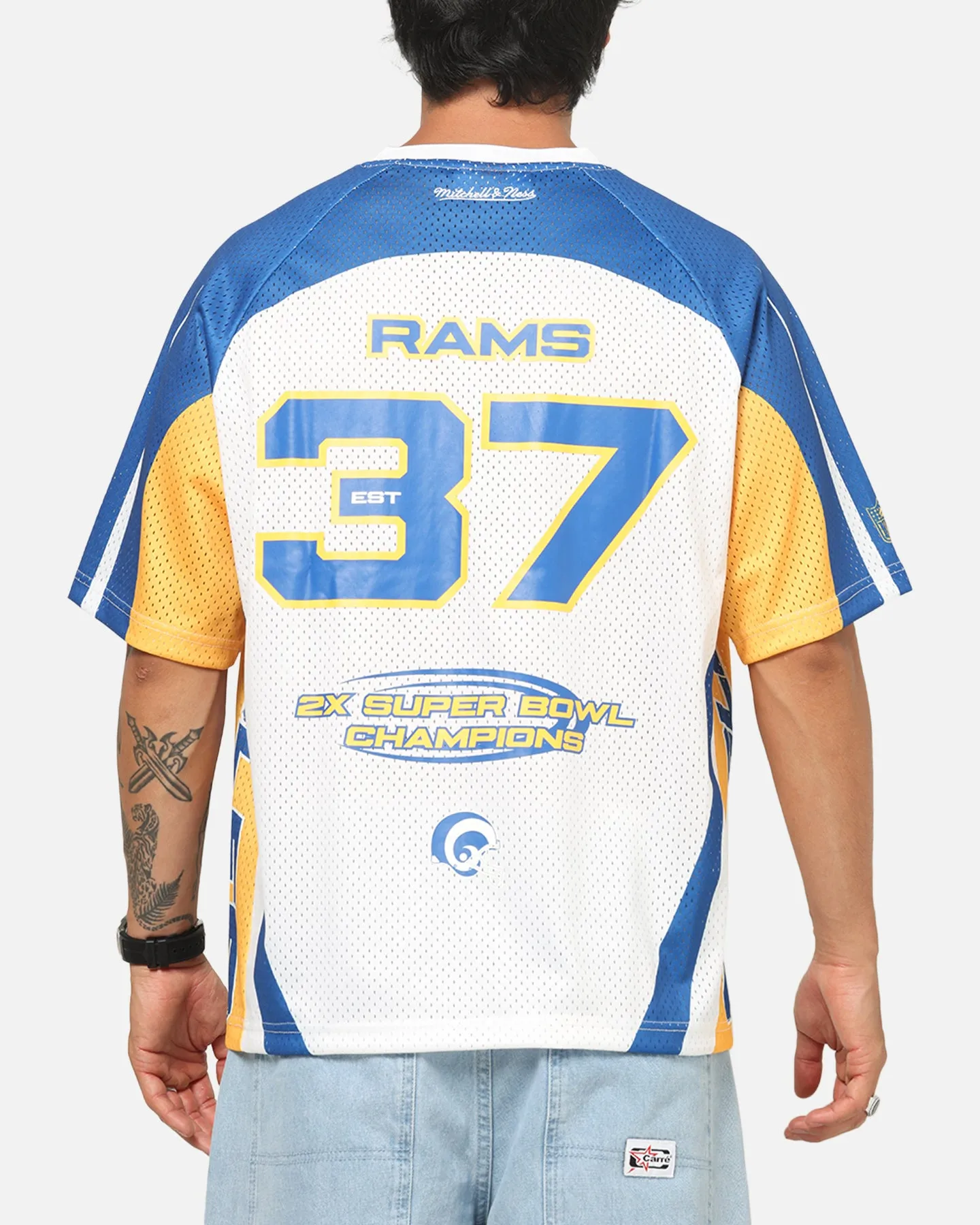 Mitchell & Ness Los Angeles Rams Warehouse Rave Jersey White/Blue/Yellow sold by Culture Kings