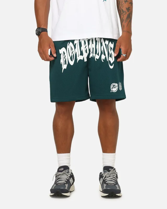 Mitchell & Ness Miami Dolphins Stars & Text Mesh Shorts Deep Sea Teal sold by Culture Kings