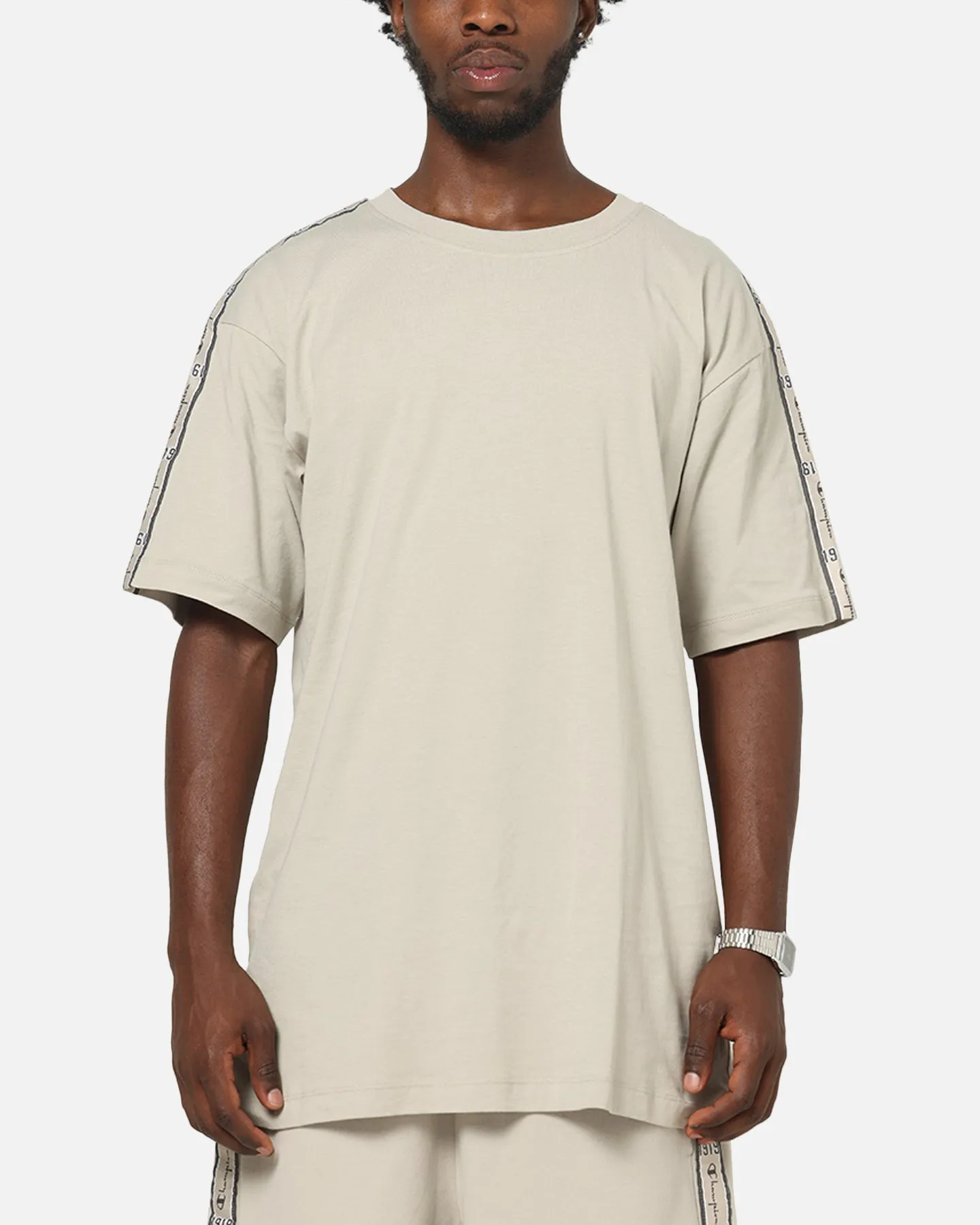 Champion SPS Lux Taping T-Shirt Beige sold by Culture Kings