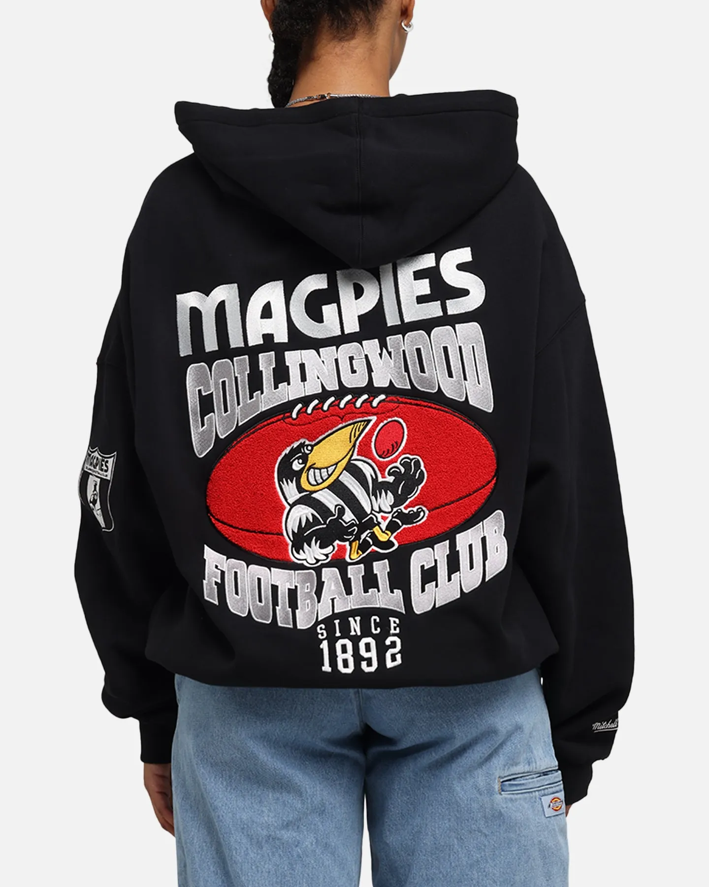 Mitchell & Ness Collingwood Magpies Team Hoodie Solid Black sold by Culture Kings