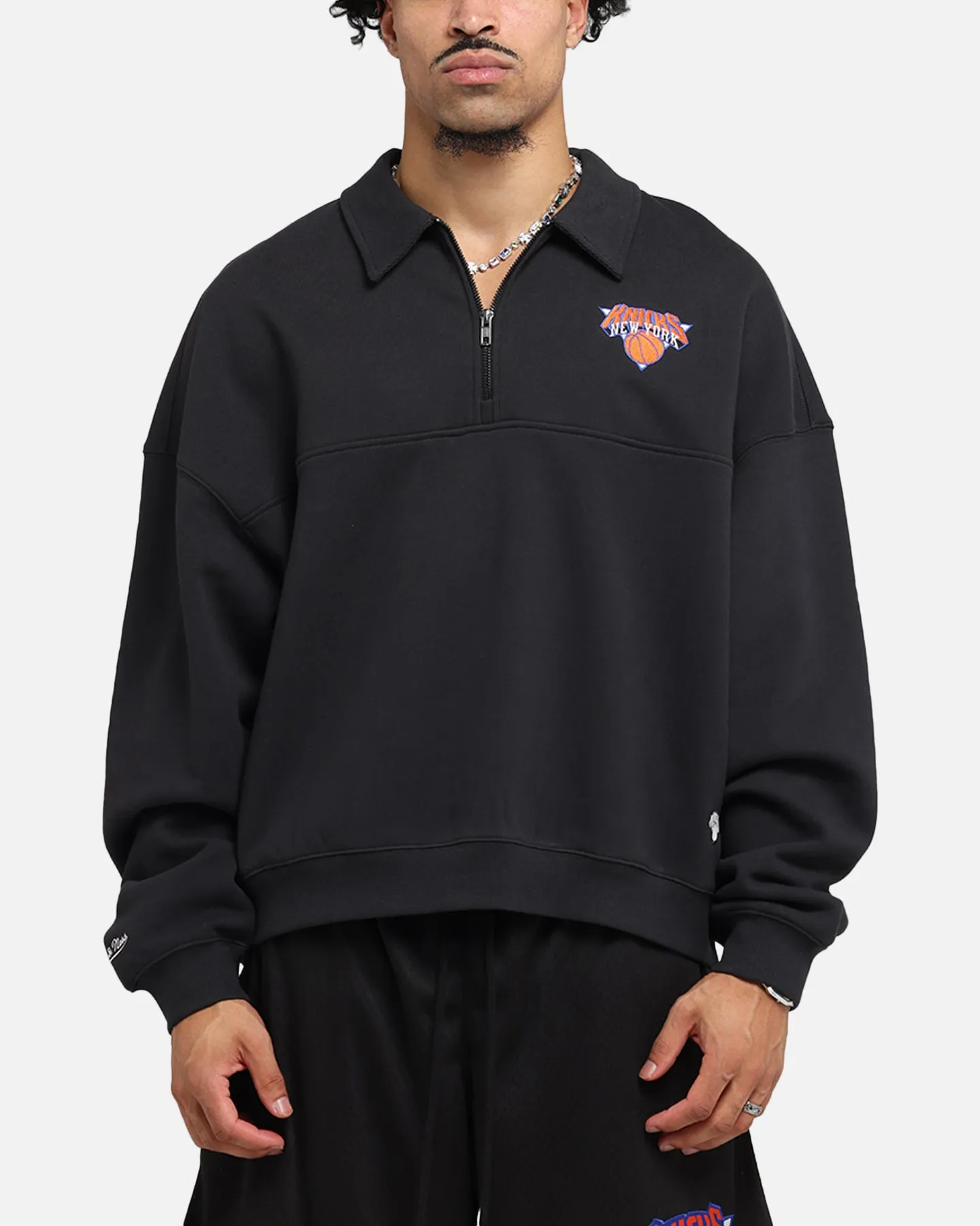 Mitchell & Ness New York Knicks Boxy Quarter Zip Crewneck Faded Black sold by Culture Kings