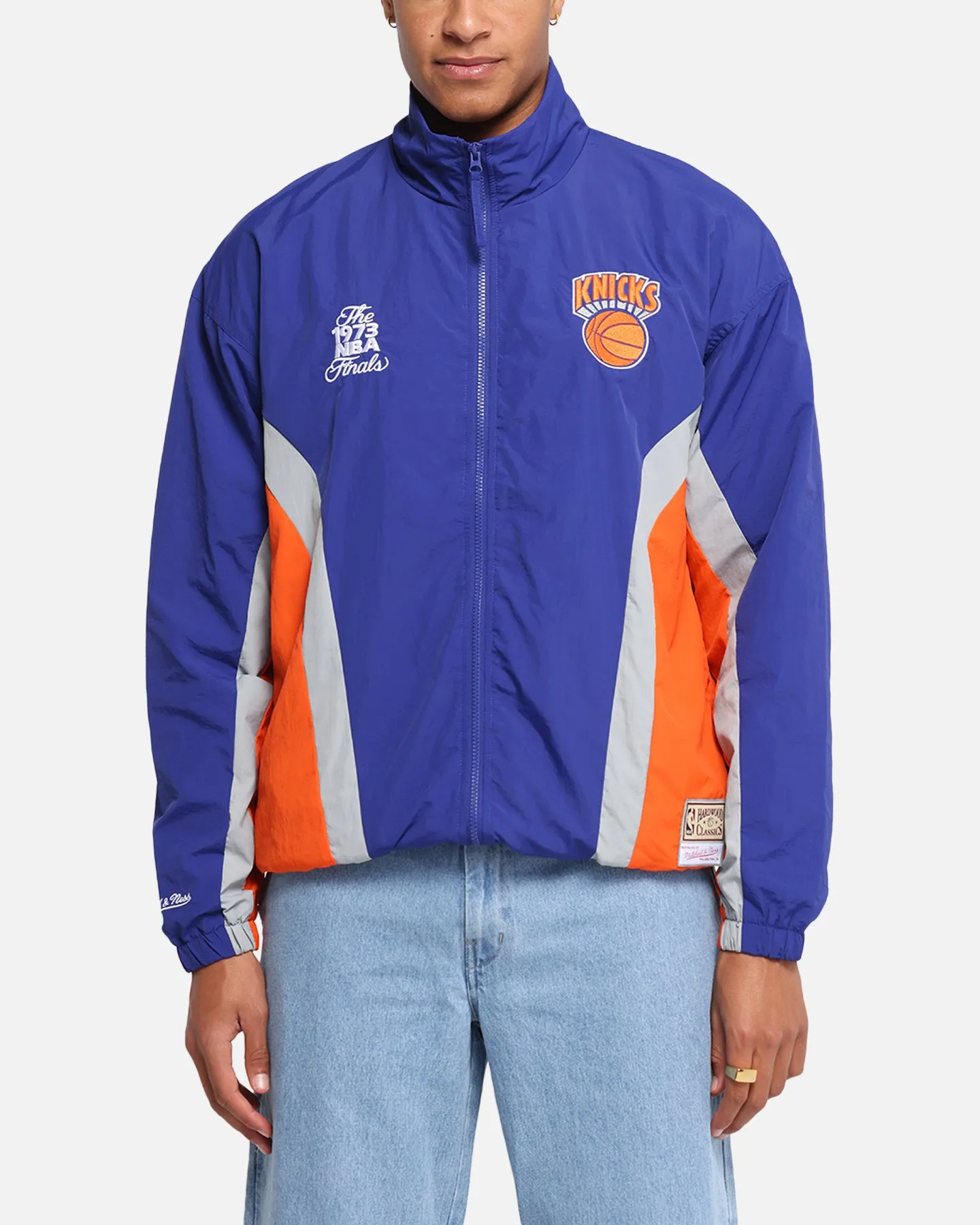 Mitchell & Ness New York Knicks Nylon Track Jacket Blue/Orange sold by Culture Kings