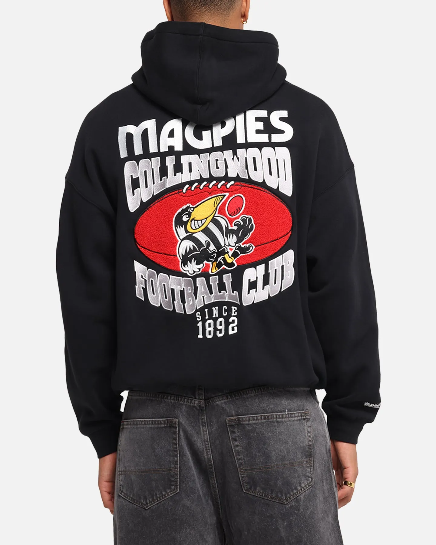 Mitchell & Ness Collingwood Magpies Team Hoodie Solid Black sold by Culture Kings