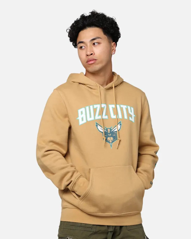 New Era Charlotte Hornets NBA 2023 Hoodie Medium Beige sold by Culture Kings