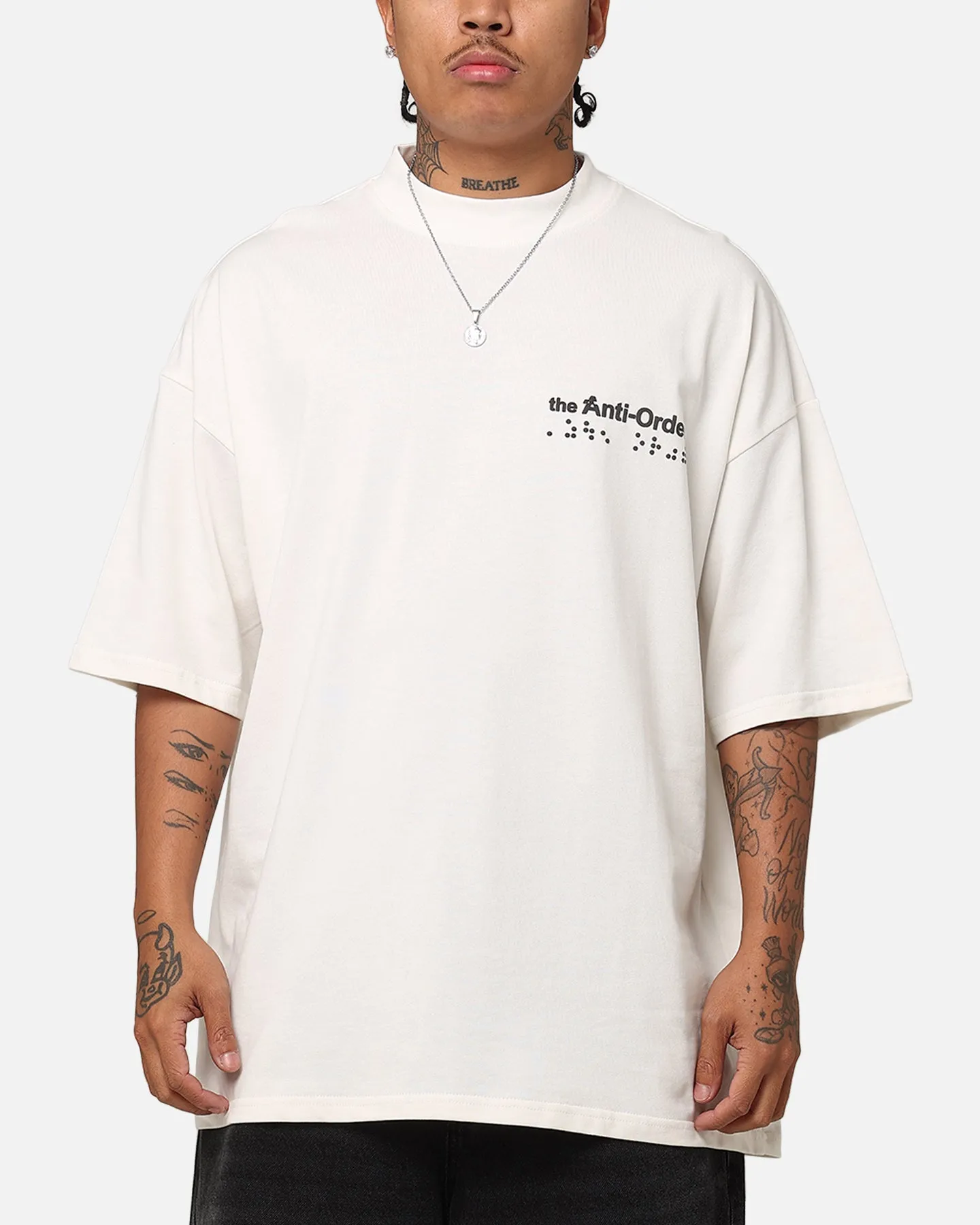 The Anti Order Brail Mock Neck T-Shirt Off White/Black sold by Culture Kings