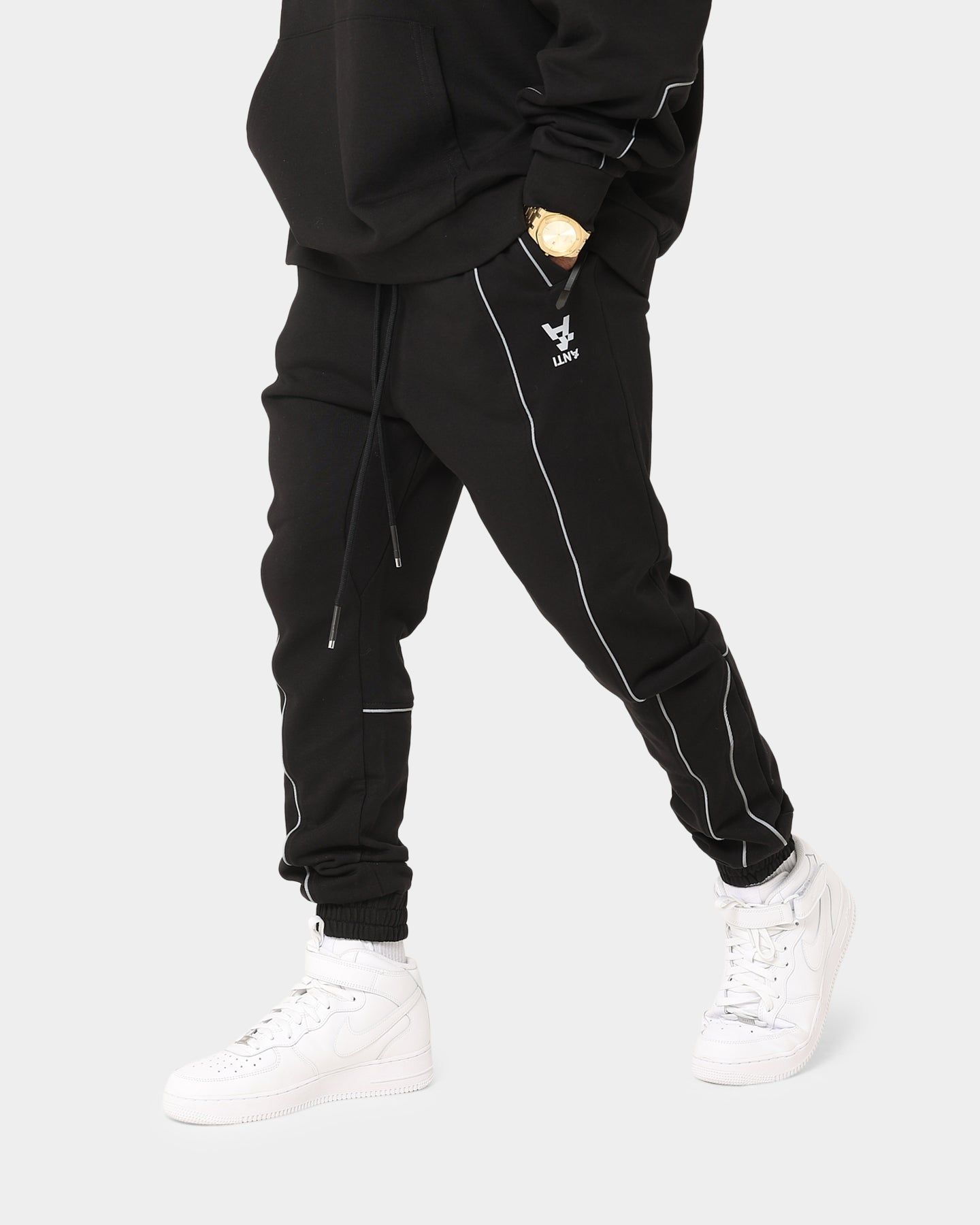 The Anti Order Neon Flux Track Pants Black/Reflective sold by Culture Kings