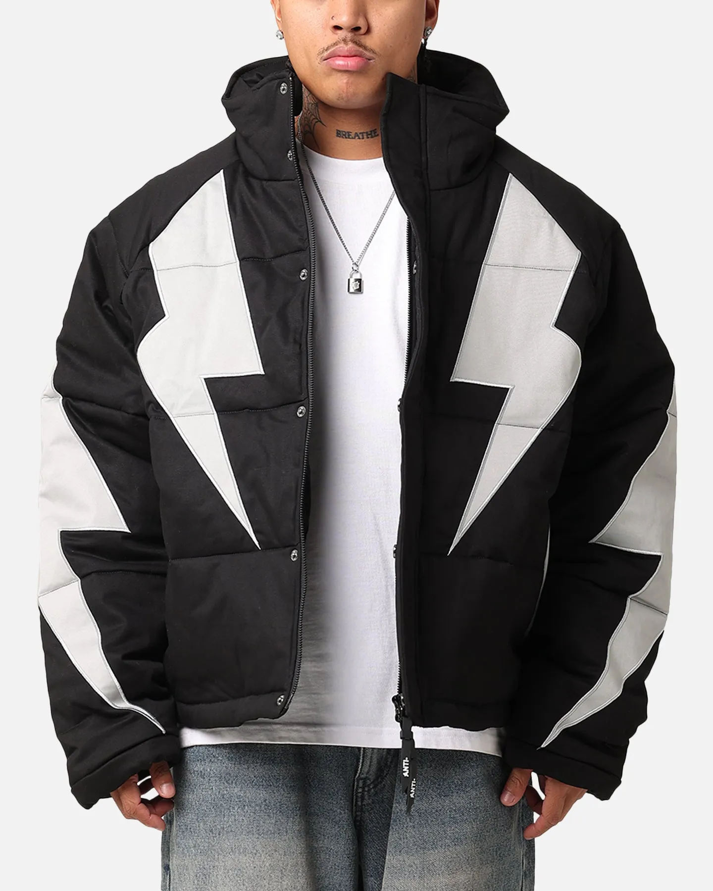 The Anti Order Life Is War Puffer Jacket Black/Grey sold by Culture Kings