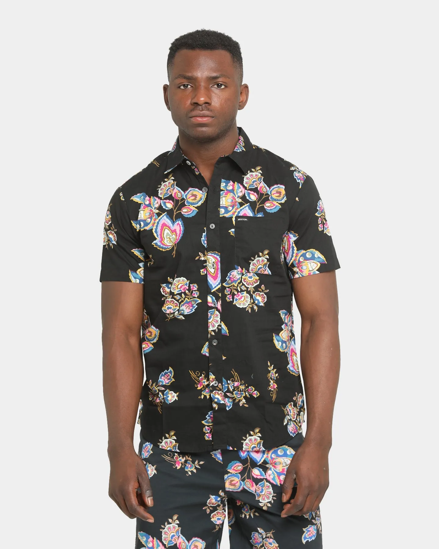 Brixton Charter Print Short Sleeve Woven Shirt Black/Purple sold by Culture Kings