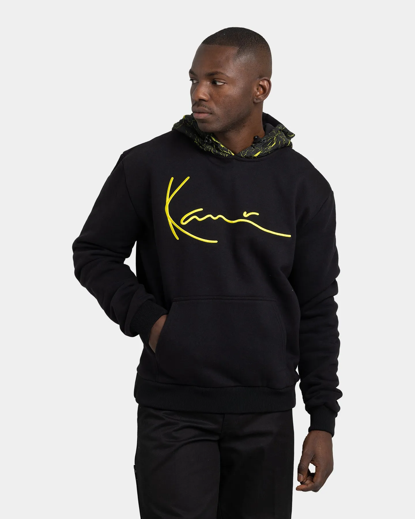 Karl Kani Men's Signature Patch Hoodie Black/Yellow sold by Culture Kings