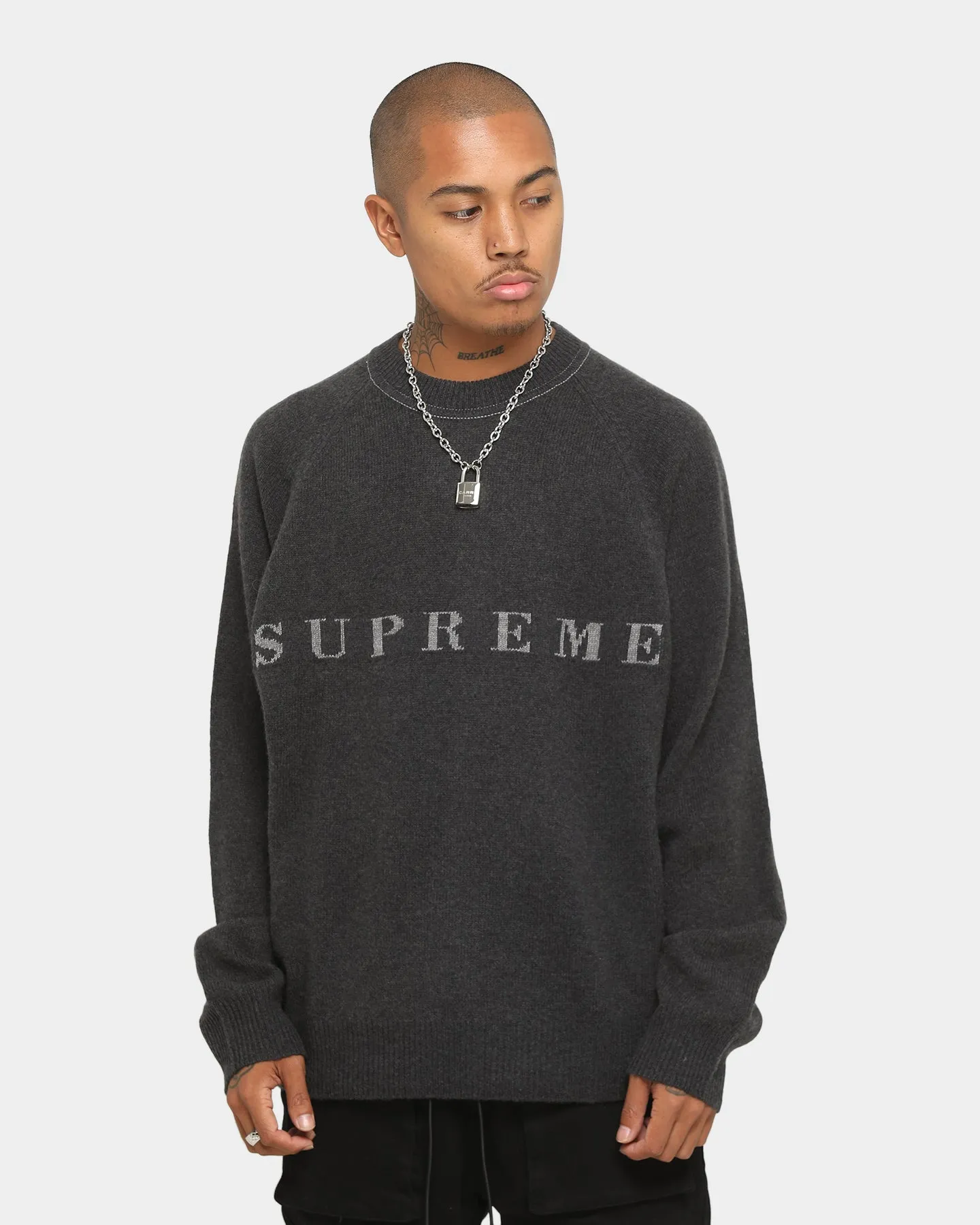 Supreme Stone Washed Sweater Black sold by Culture Kings