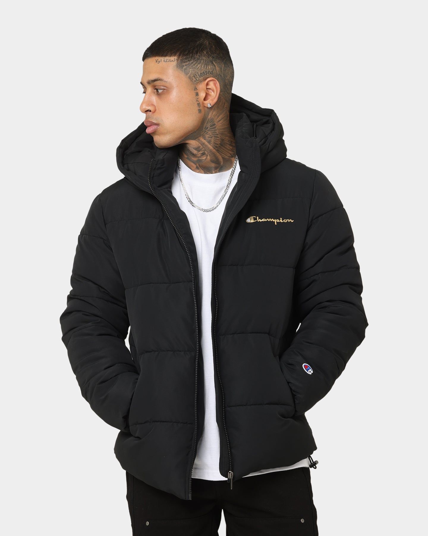 Champion Rochester Puffer Jacket Black/Gold sold by Culture Kings