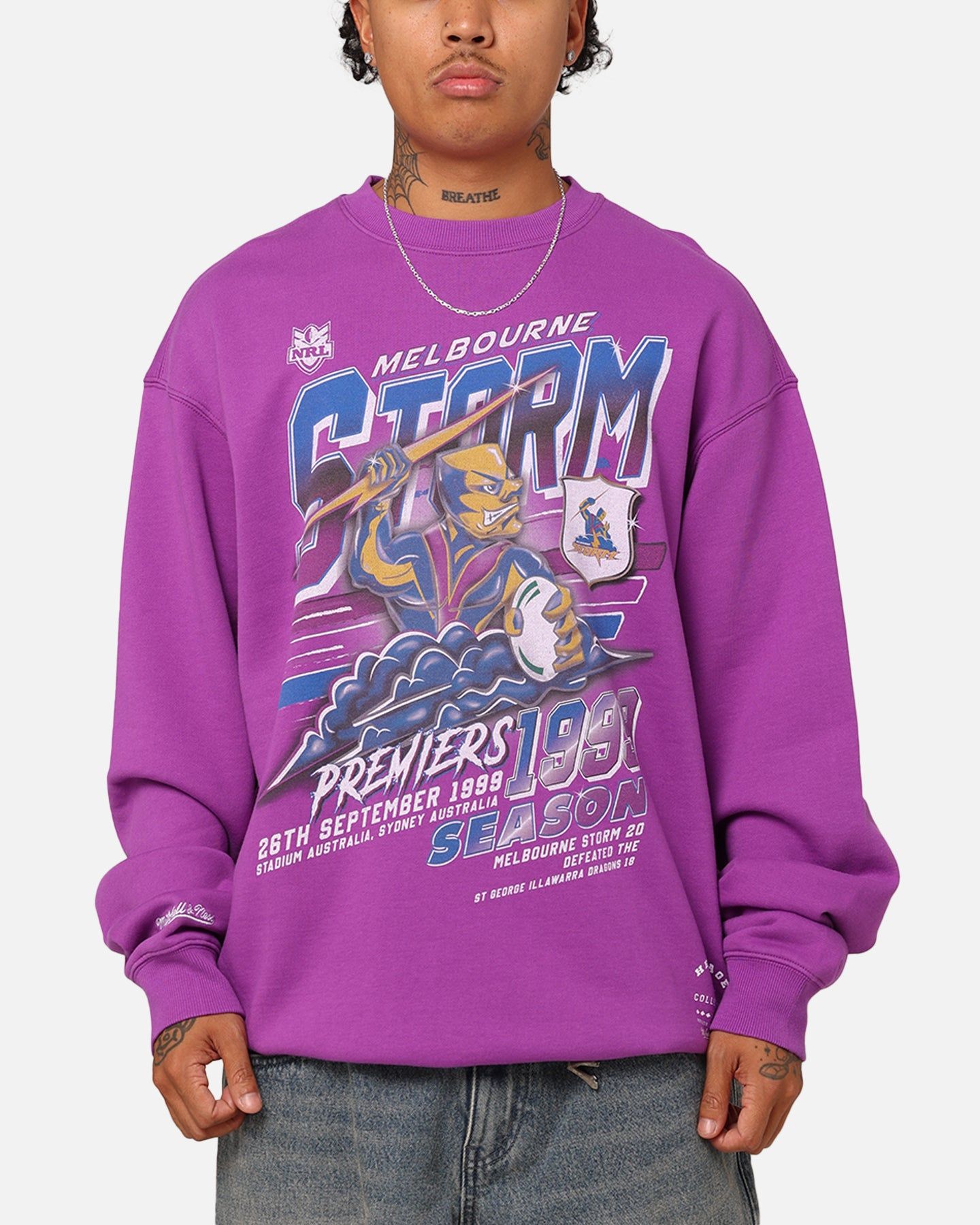 Mitchell & Ness Melbourne Storm Premiers 1999 Season Crewneck Purple sold by Culture Kings