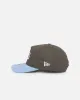 New Era Los Angeles Lakers 'Contrast Visor' Pre-Curved Golfer Snapback Moss/Sky sold by Culture Kings