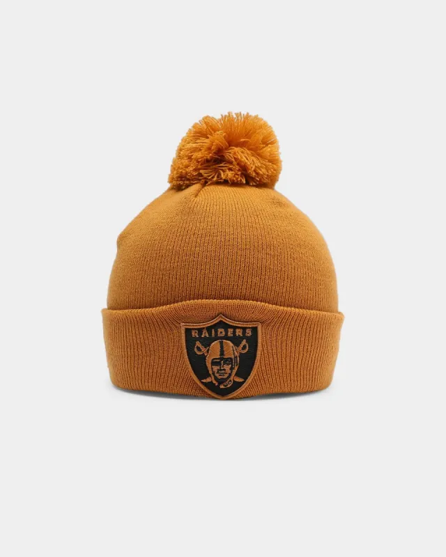 New Era Oakland Raiders Pom Knit Beanie Wheat sold by Culture Kings