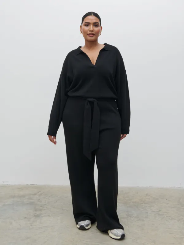 Meg Belted Knit Jumpsuit Curve - Black sold by Pretty Lavish