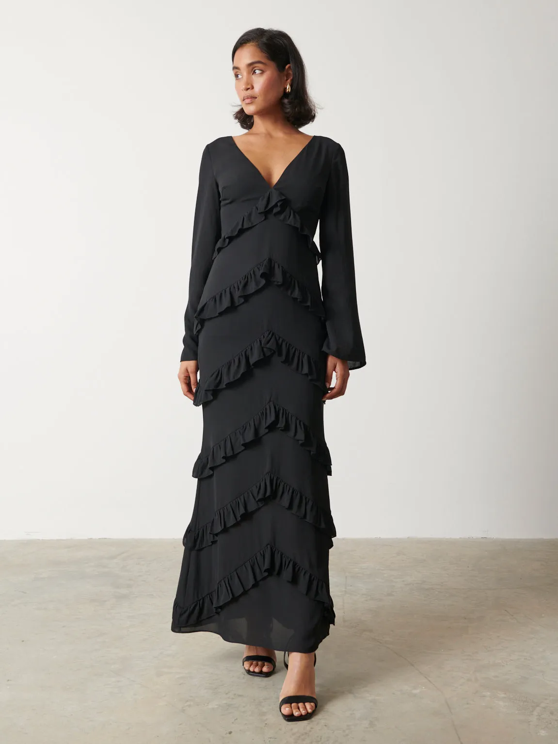 Paige Ruffle Maxi Dress - Black sold by Pretty Lavish
