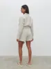 Emilie Belted Playsuit - Oatmeal sold by Pretty Lavish