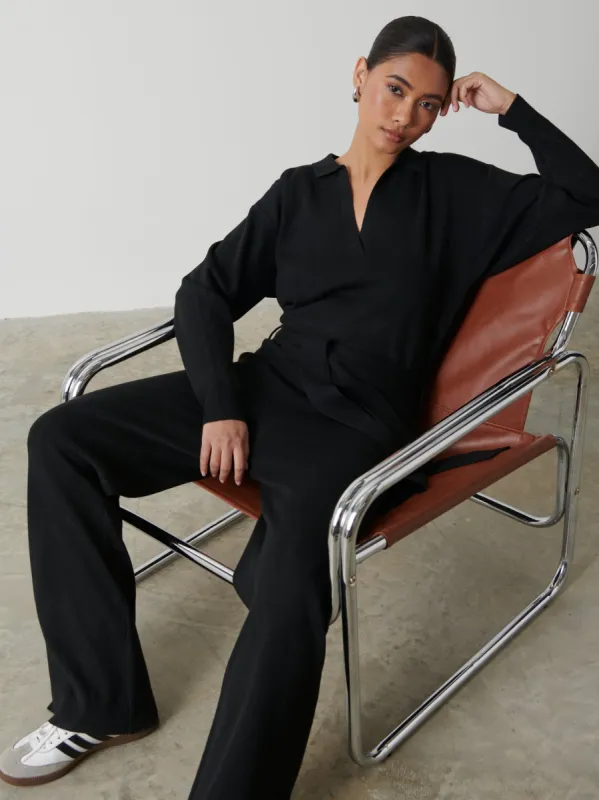 Meg Belted Knit Jumpsuit - Black sold by Pretty Lavish