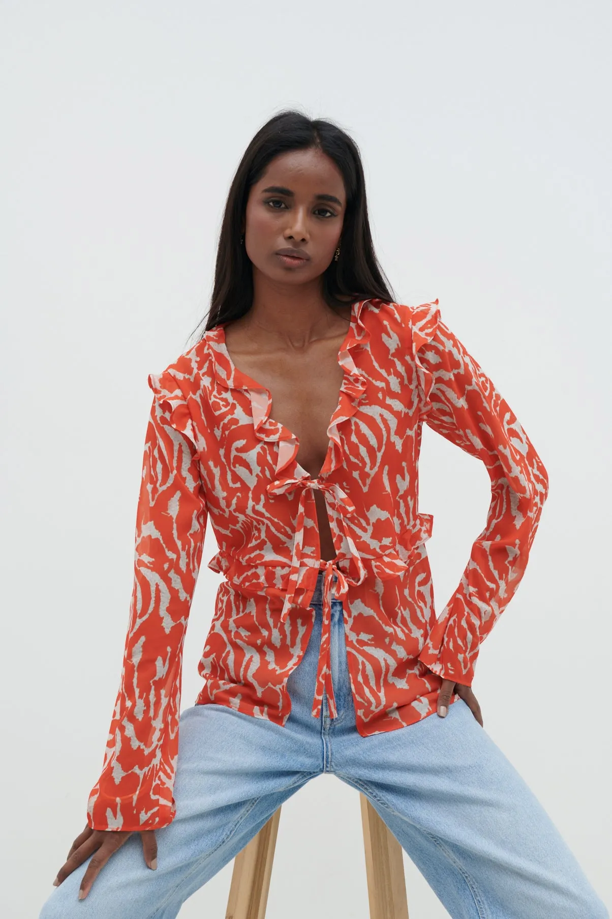 Tomlin V Neck Ruffle Tie Blouse - Zebra Orange sold by Pretty Lavish