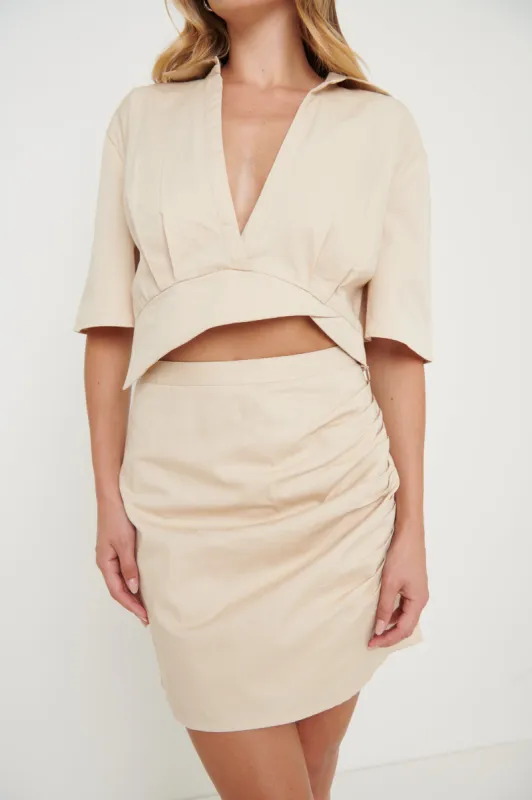 Flynn Ruched Mini Skirt - Beige sold by Pretty Lavish