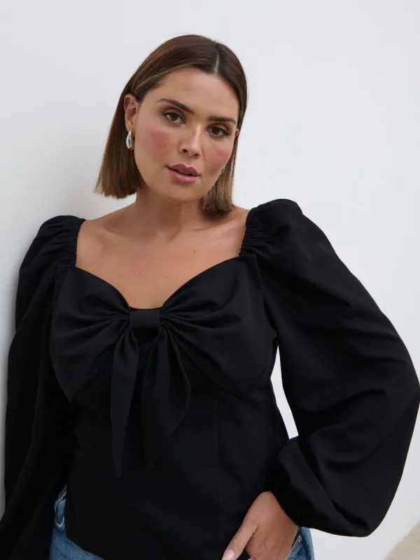 Jemima Exaggerated Bow Top Curve - Black sold by Pretty Lavish