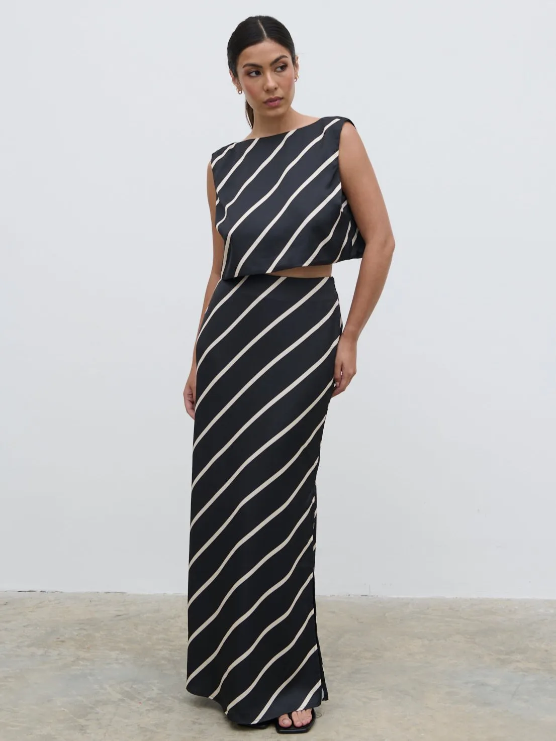 Zuri Maxi Skirt - Black and Cream Asymmetric Stripe sold by Pretty Lavish product image thumbnail 4