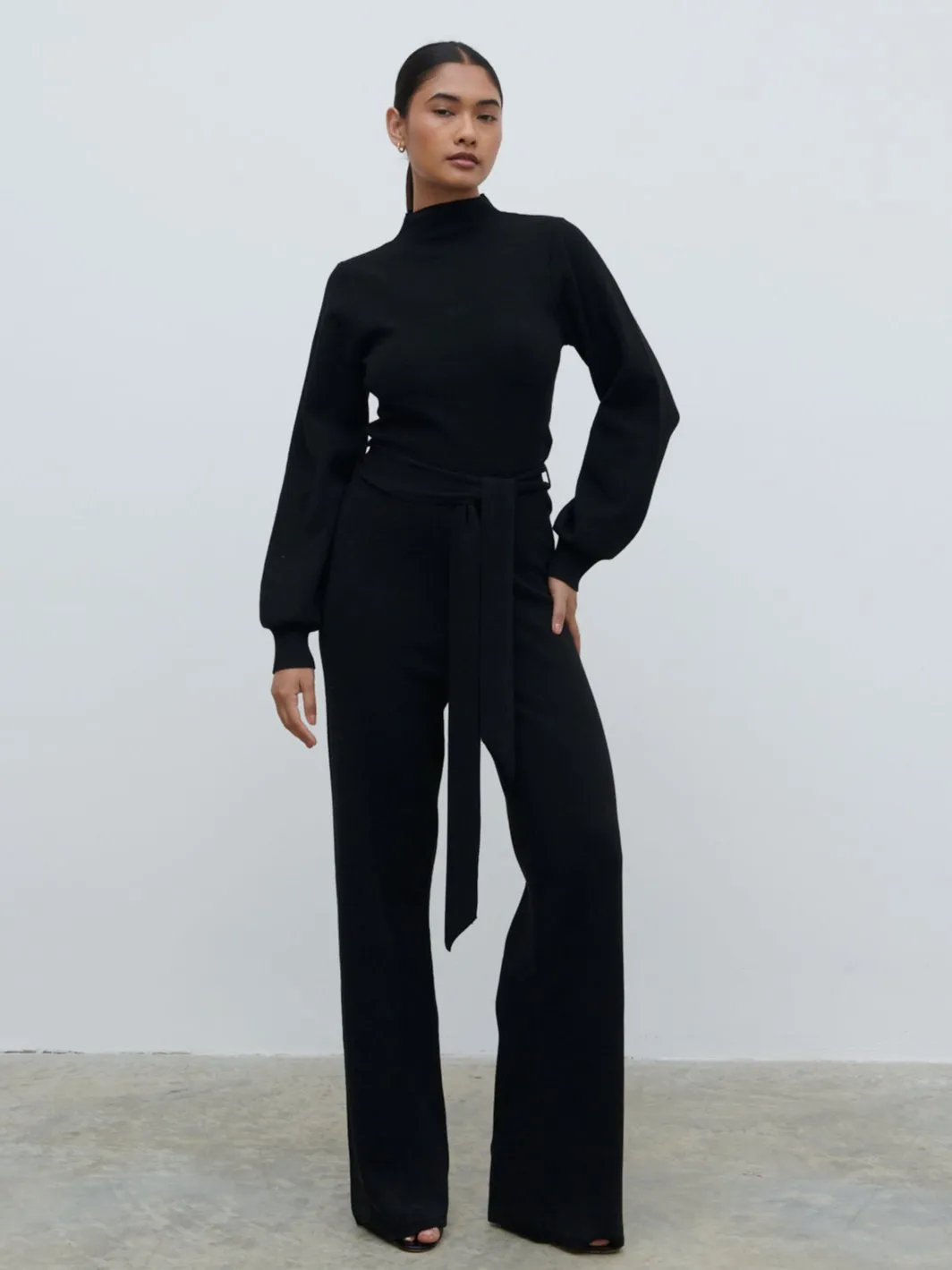 Reign Tie Waist Knit Jumpsuit - Black sold by Pretty Lavish