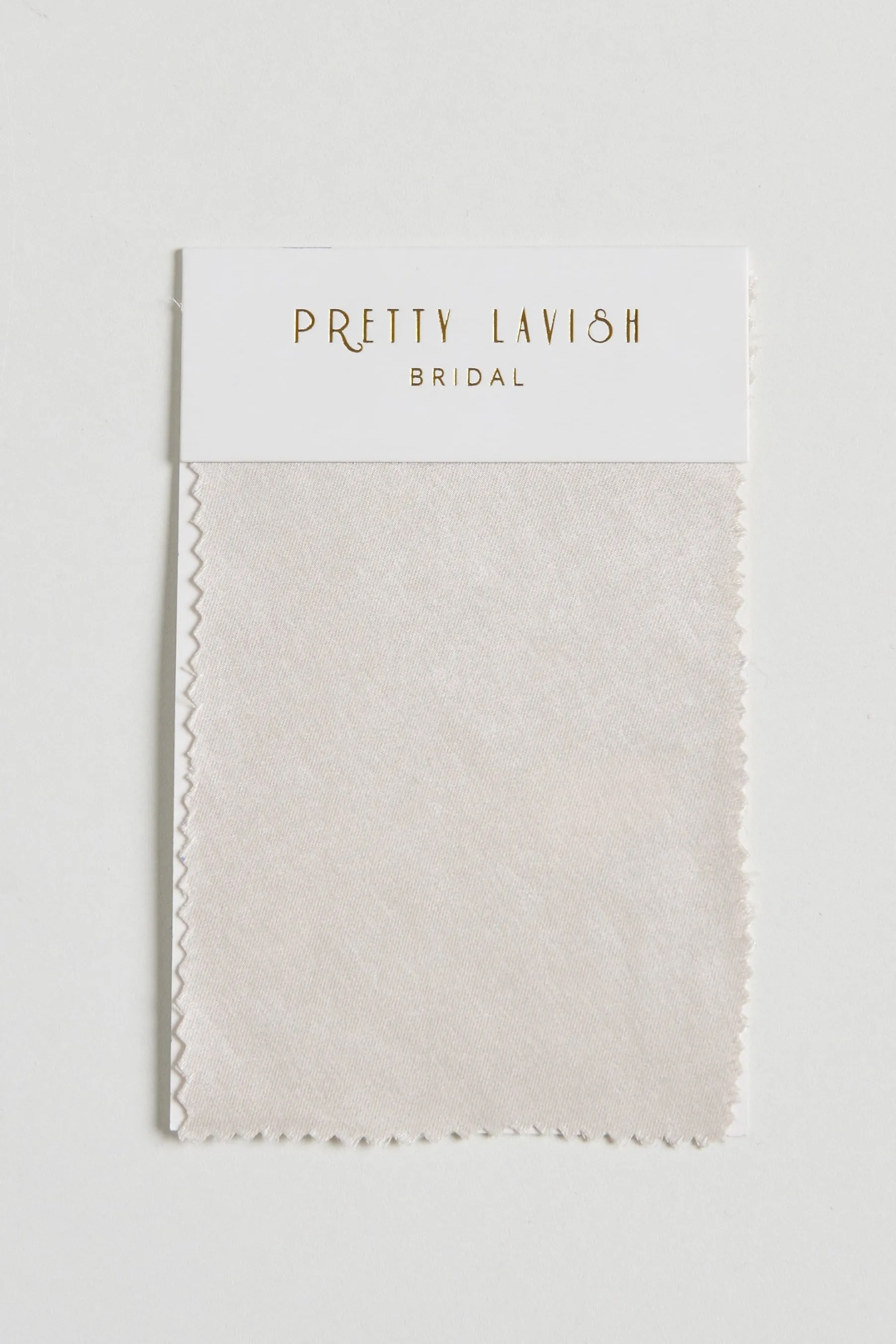 Recycled Champagne Satin Swatch sold by Pretty Lavish