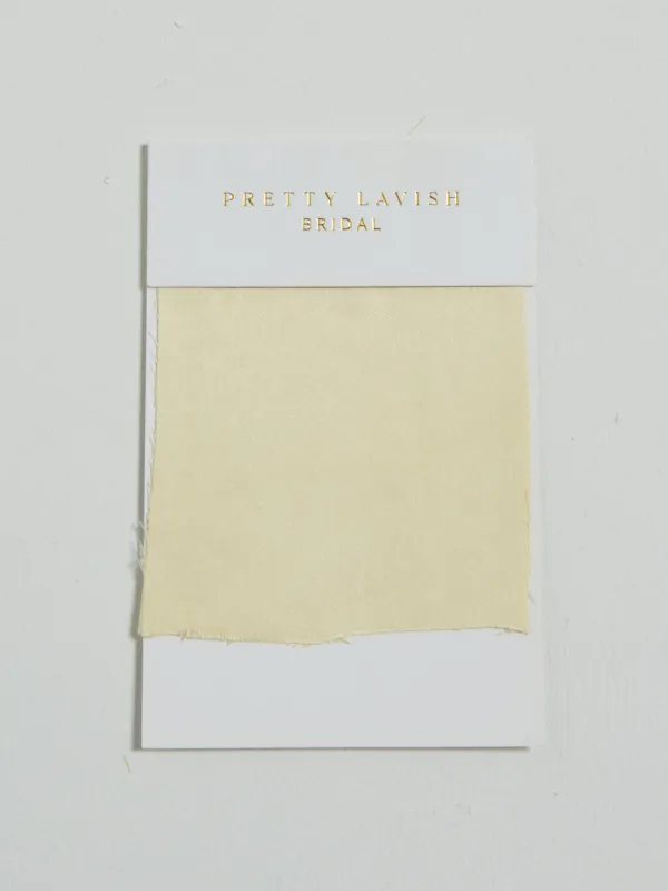 Recycled Lemon Satin Swatch sold by Pretty Lavish