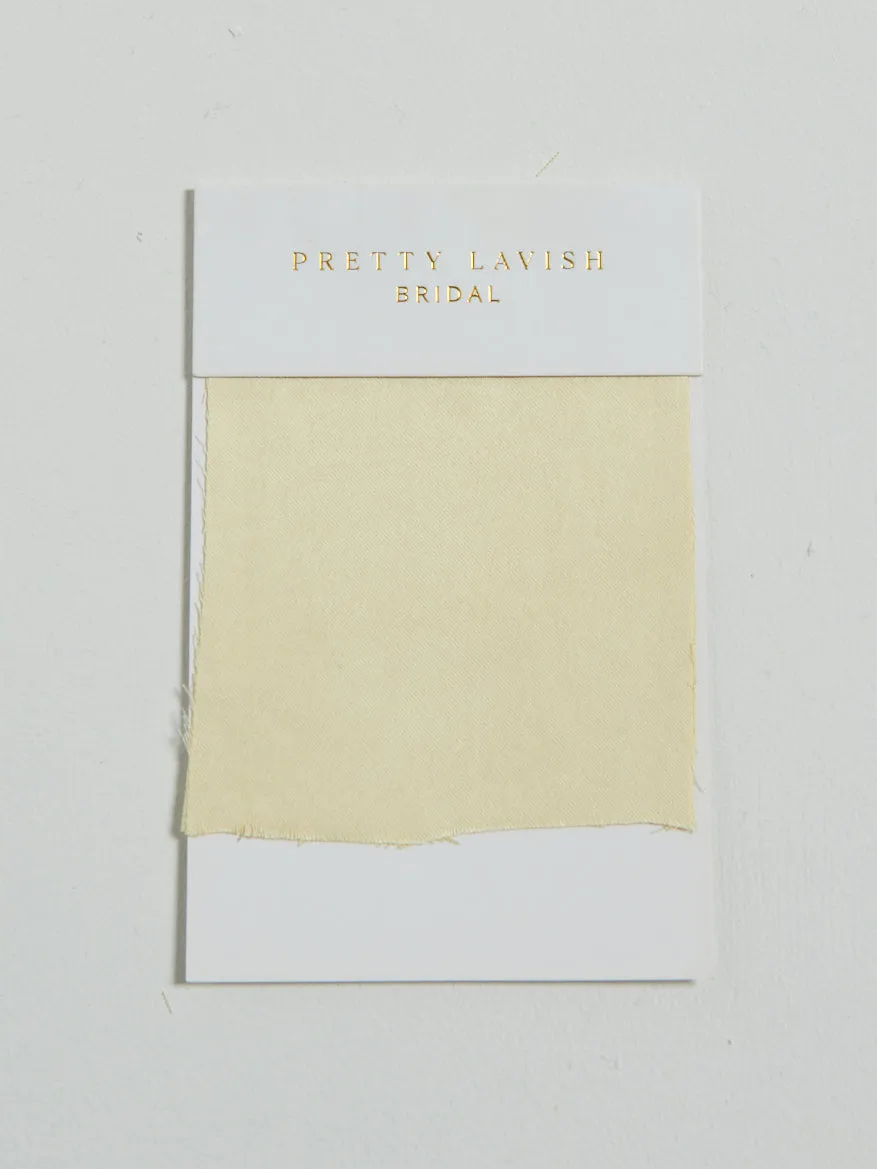 Recycled Lemon Satin Swatch sold by Pretty Lavish