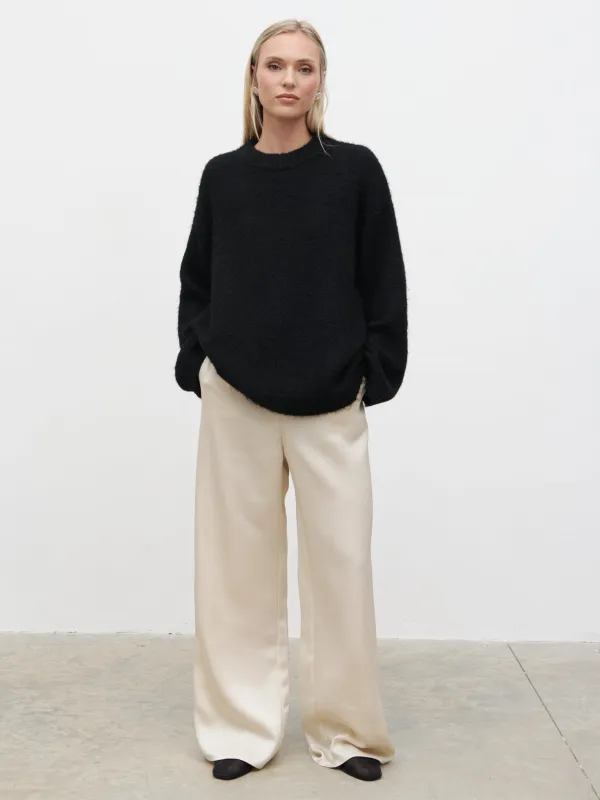 Cece Fluffy Jumper - Black sold by Pretty Lavish