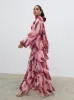 Anya Plunge Neck Ruffle Maxi Dress - Feather Print sold by Pretty Lavish