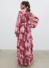 Anya Plunge Neck Ruffle Maxi Dress - Feather Print sold by Pretty Lavish