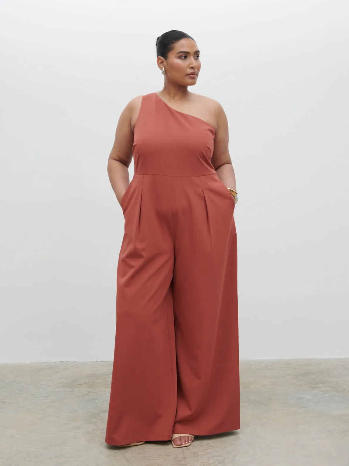 Natalie One Shoulder Jumpsuit Curve - Terracotta sold by Pretty Lavish