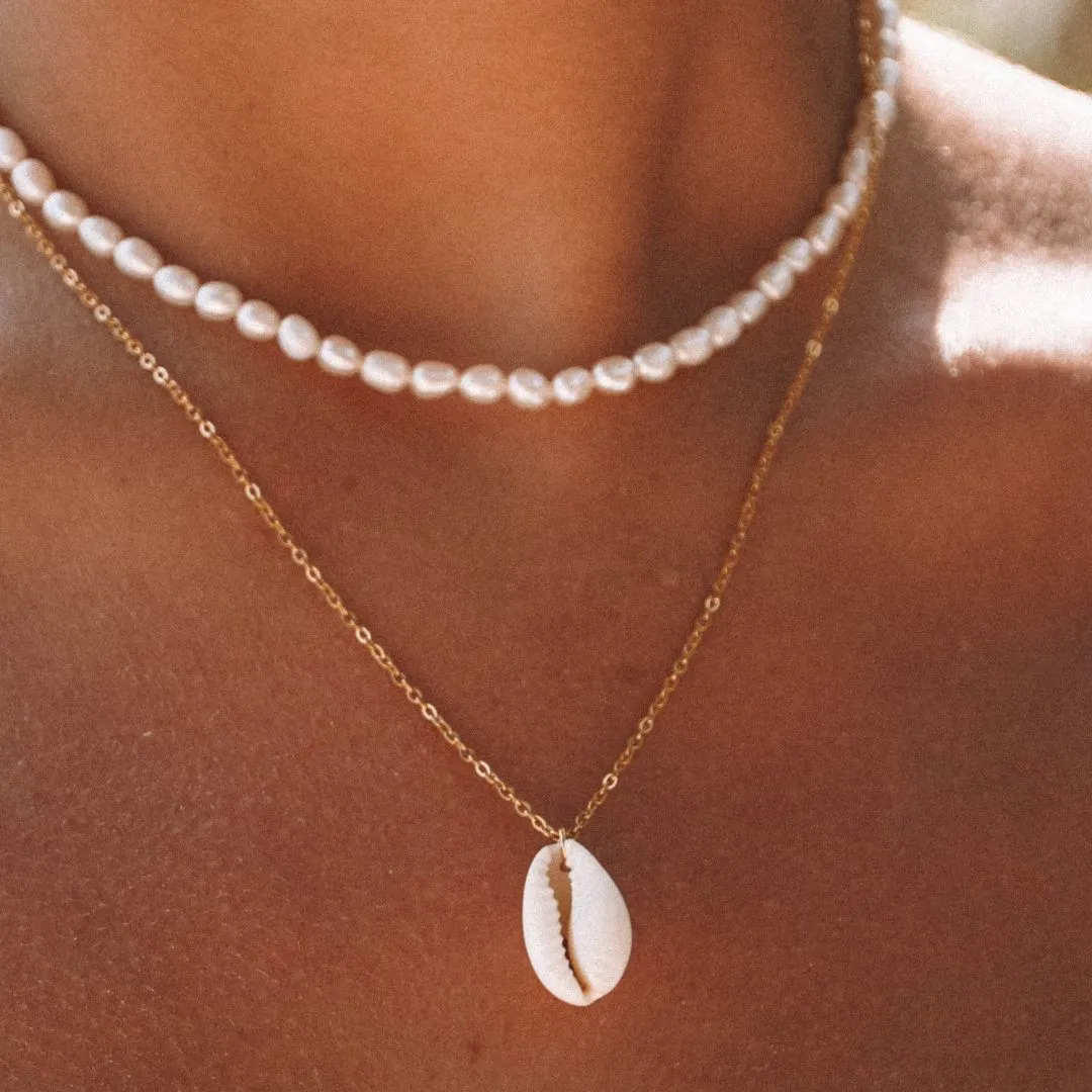 Cowrie Shell Pendant sold by Atolea