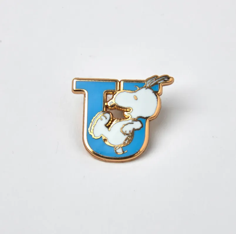 PEANUTS U ALPHABET ENAMEL PIN sold by TSPTR