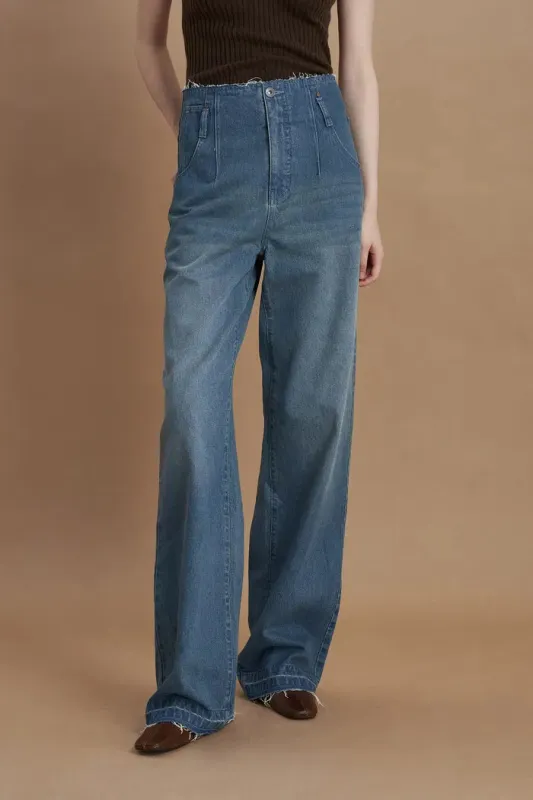 Vega High-Waisted Frayed Hem Jeans in Washed Cotton Denim sold by Fabrique