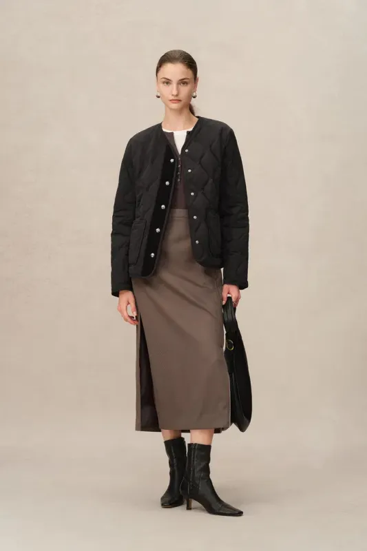 Olivia Black Cropped Lightweight Puffer Jacket in High-Density Water-Repellent Fabric sold by Fabrique