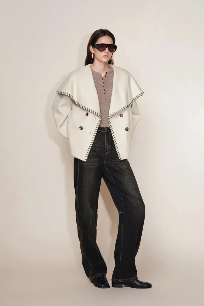 Lumi Handworked Faux Leather Hem Cape Coat in Silk Wool Double Face sold by Fabrique