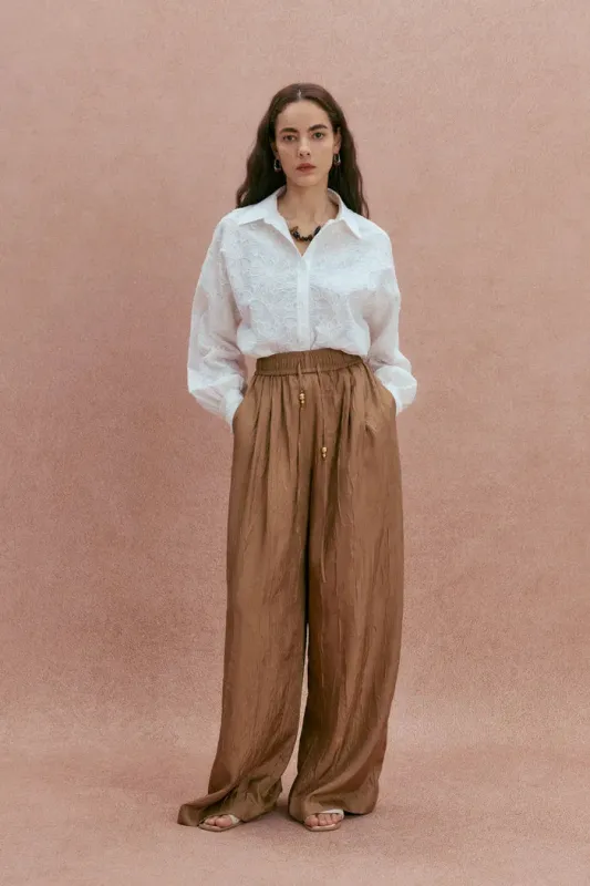 Adeline Hand Sewn Sequin Jacquard Button-Up Shirt in Cotton sold by Fabrique