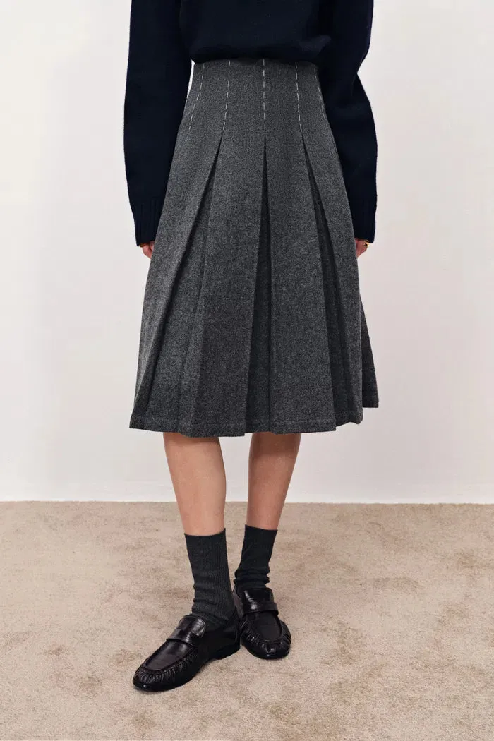 Ava Hand Embroidered Pleated Skirt in Merino Wool sold by Fabrique