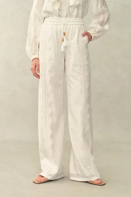 Ava Floral Drawstring Pants in Lace sold by Fabrique