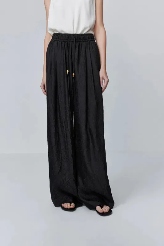 Louise Textured Loose Boho Pants in Wrinkled Satin made by Fabrique
