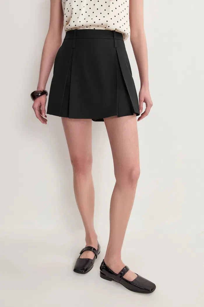 Emily Wren Pleated Mid Rise Skort in Fine Twill sold by Fabrique