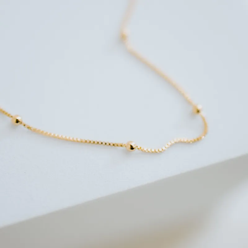Satellite Anklet made by Sydney Rose