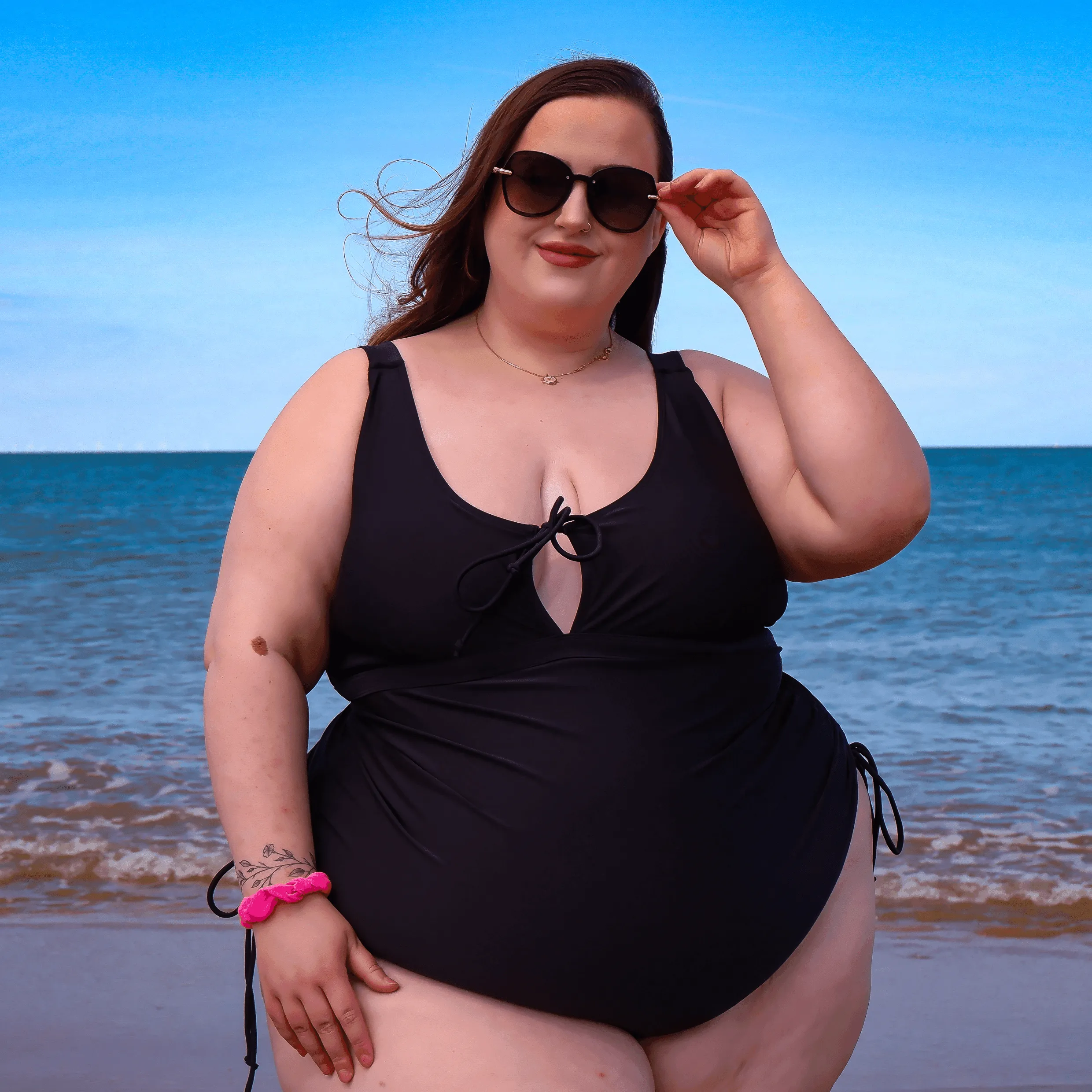 Phone Home Swimsuit sold by Snag Tights