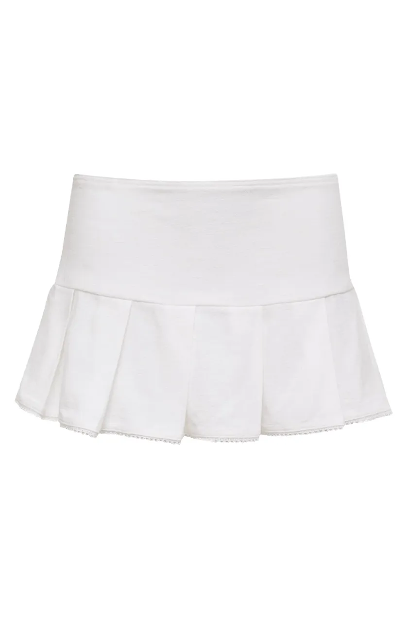 THE GRACE PLEATED MINI SKIRT IN IVORY sold by Bella Venice