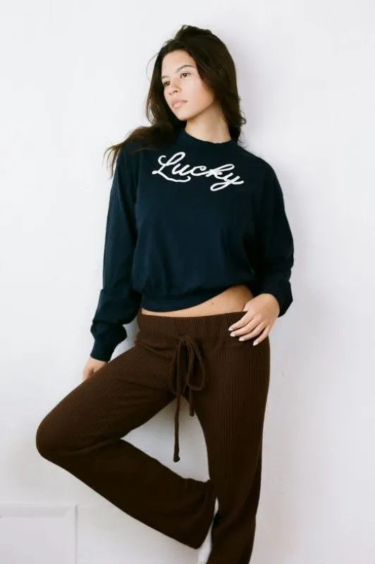 THE LUCKY SWEATSHIRT IN NAVY sold by Bella Venice